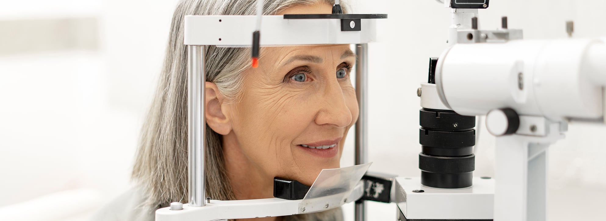 Senior woman getting an eye exam