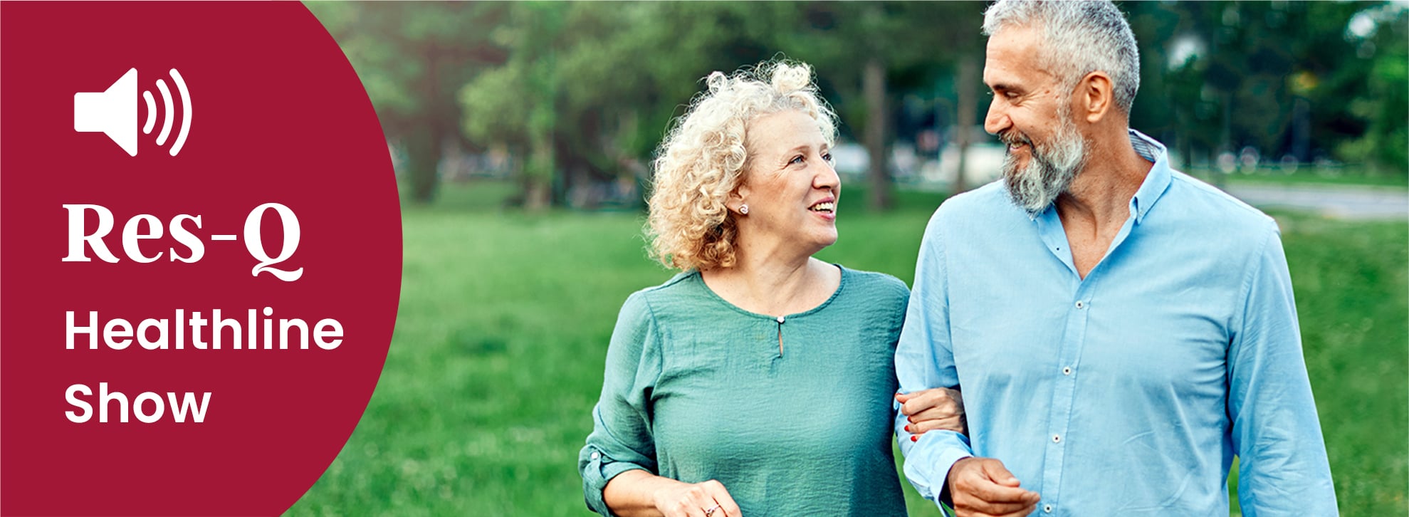 Happy, middle-aged couple walking outside